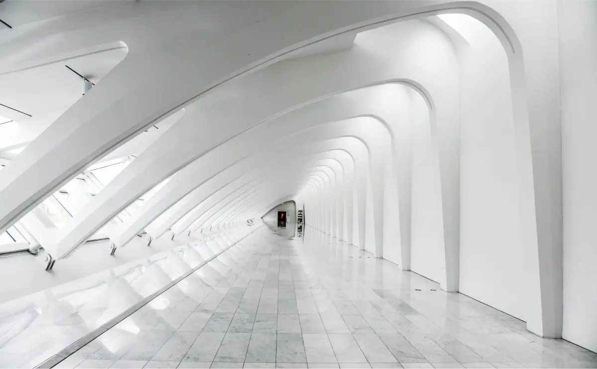 White vaulted architectural corridor: institutional governance and MIT AI committee findings on generative AI in higher education.