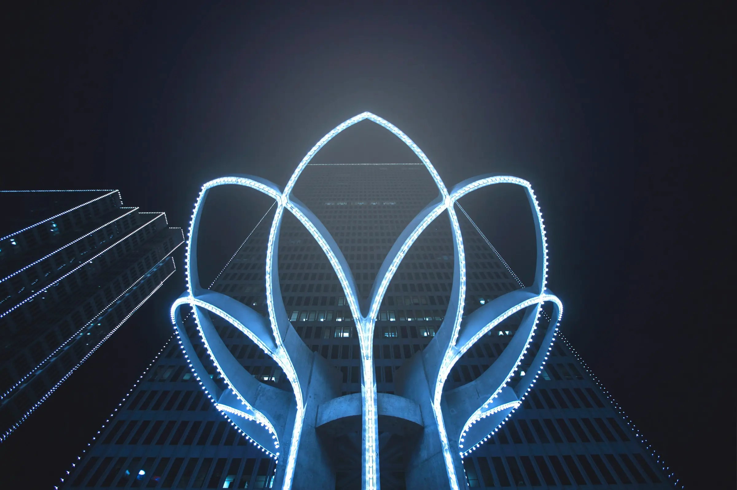 Quantum computing circuit board with blue light patterns