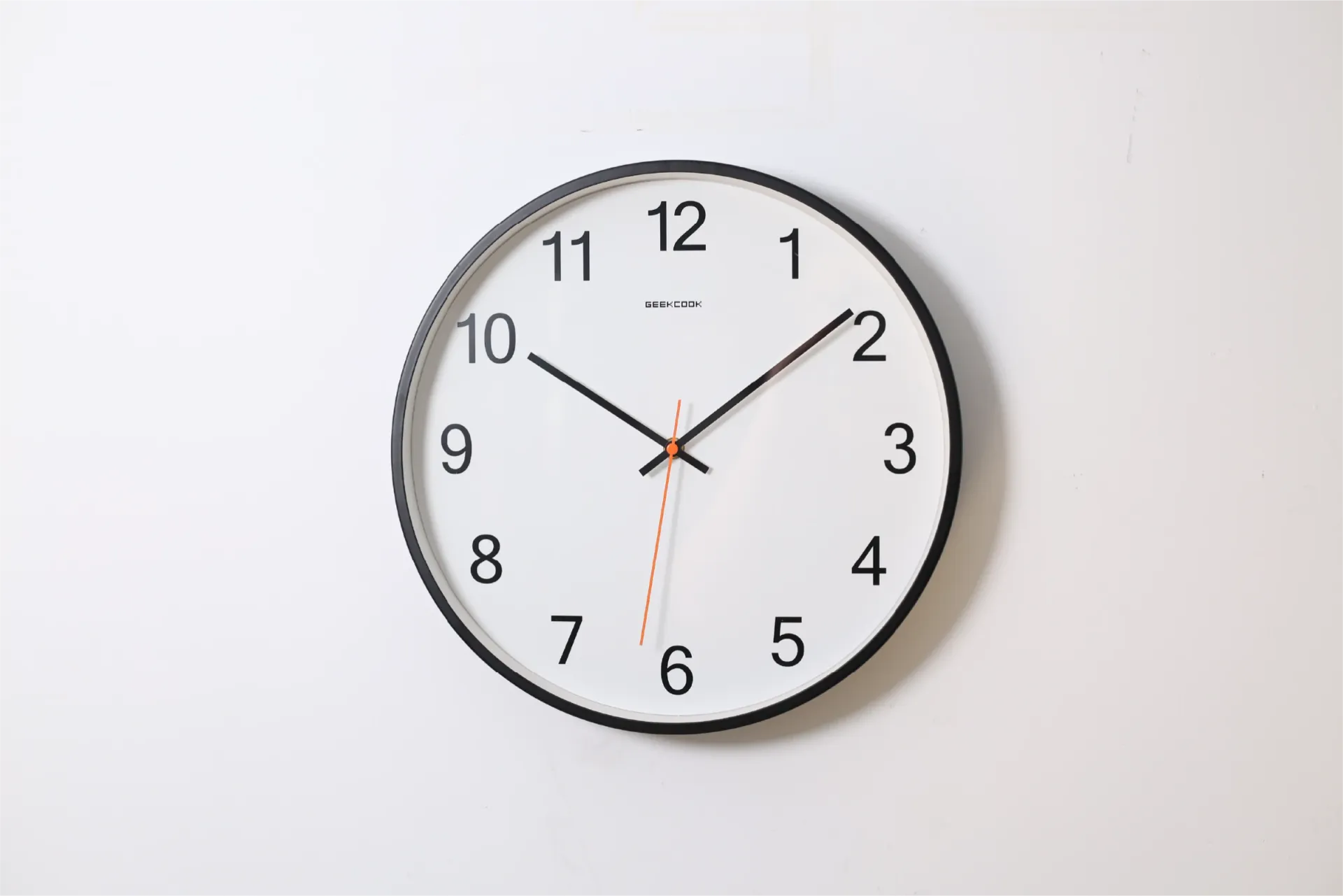 A minimalist wall clock, evoking payment operations measured in seconds.