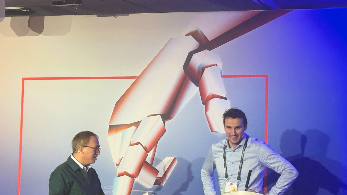 Pepijn Kooijmans presenting Hugging Face LeRobot open-source physical AI architecture at the Economist Enterprise Physical AI and Robotics Summit