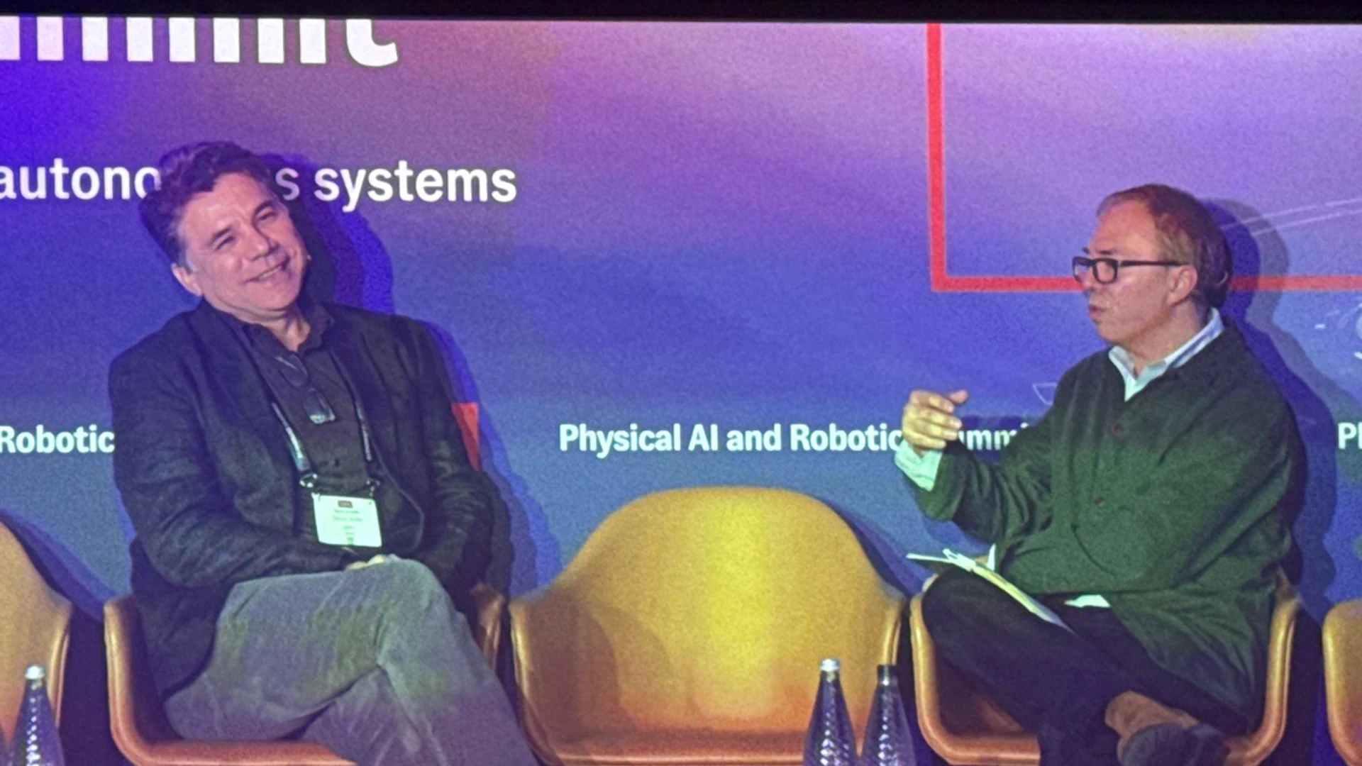 Taner Ozcelik, CEO of Mythic AI, discussing in-memory compute architecture and chiplet deployment with Kenneth Cukier at the Economist Enterprise Physical AI and Robotics Summit in London