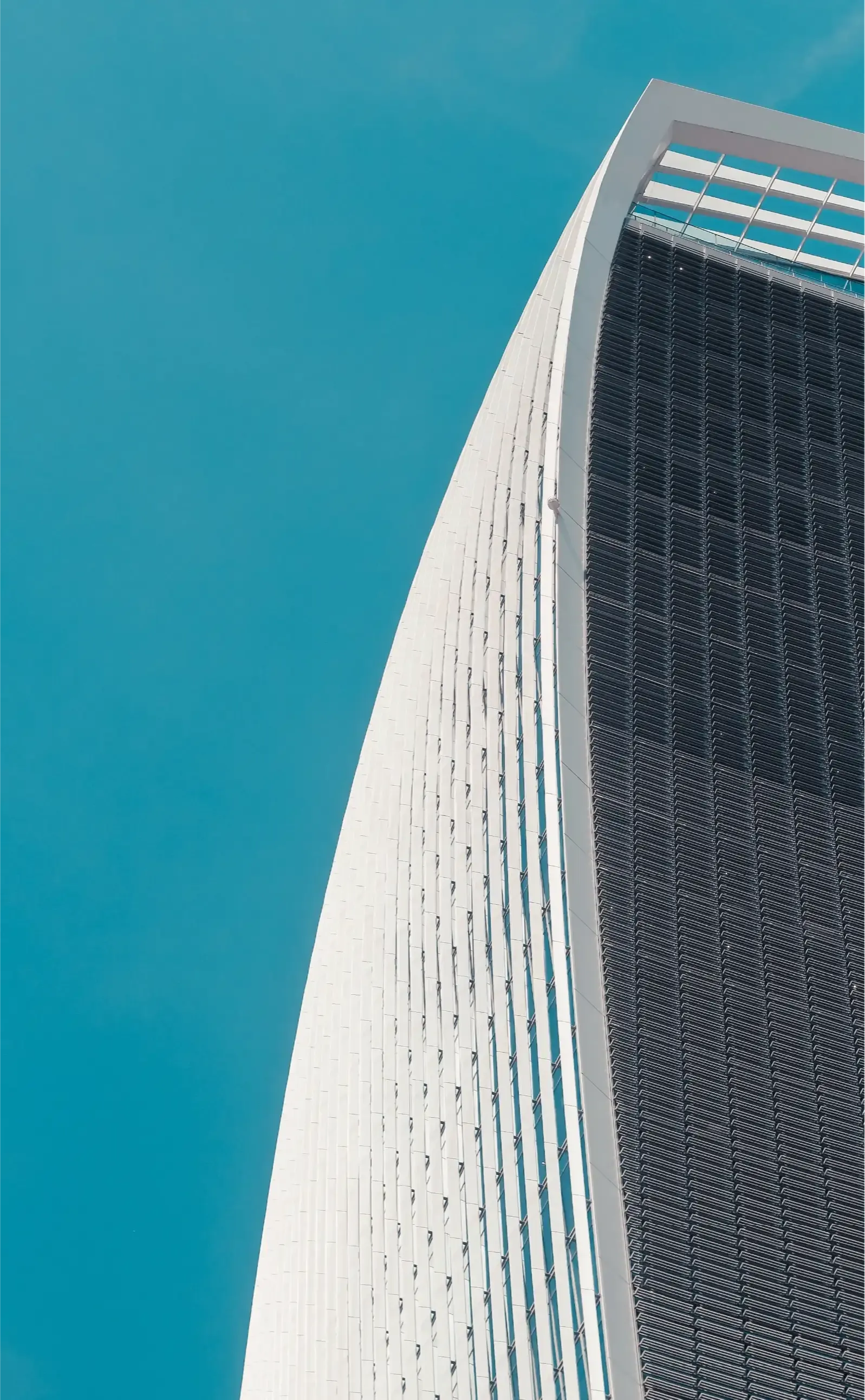 Soft natural light over a modern architectural space, representing dependable financial infrastructure.