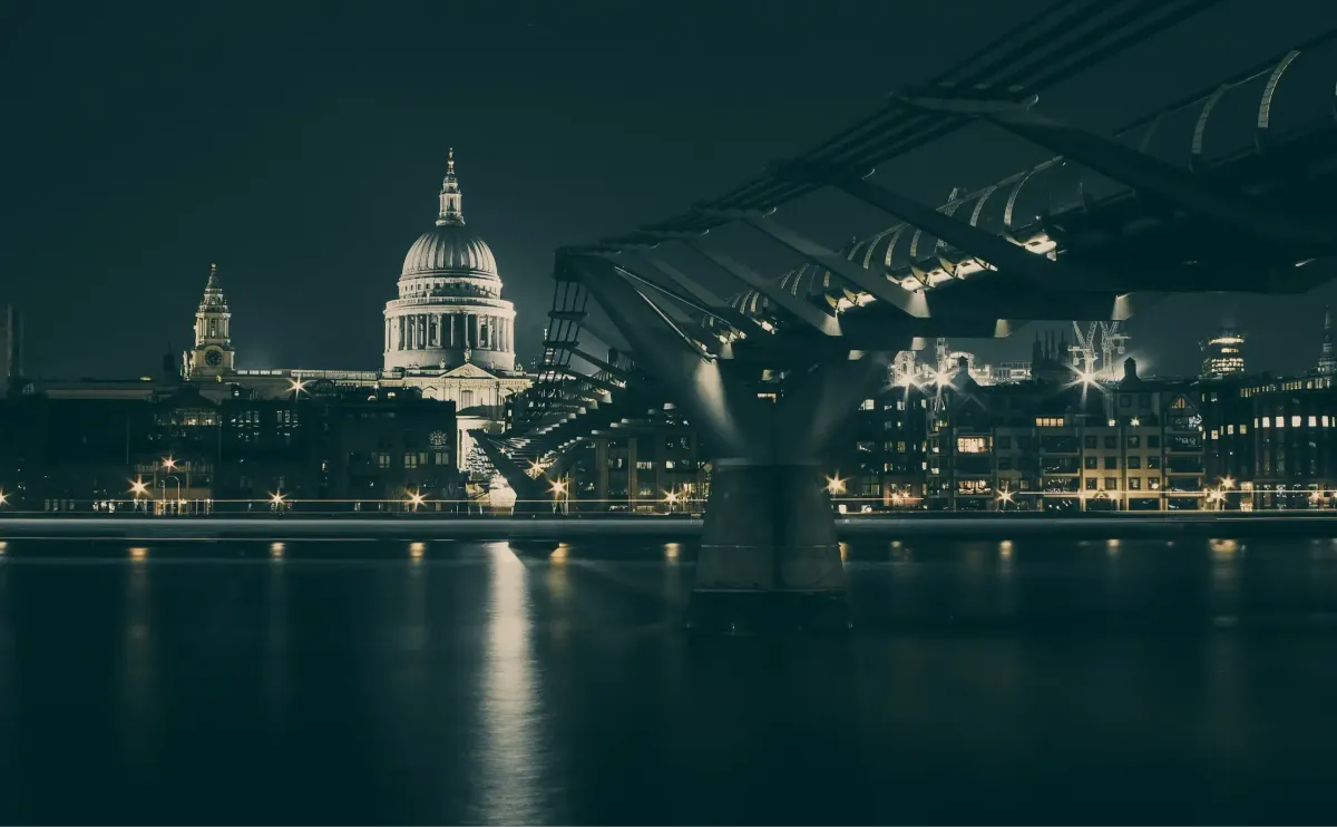 Iconic financial architecture of London at night, highlighting high-assurance parsing infrastructure